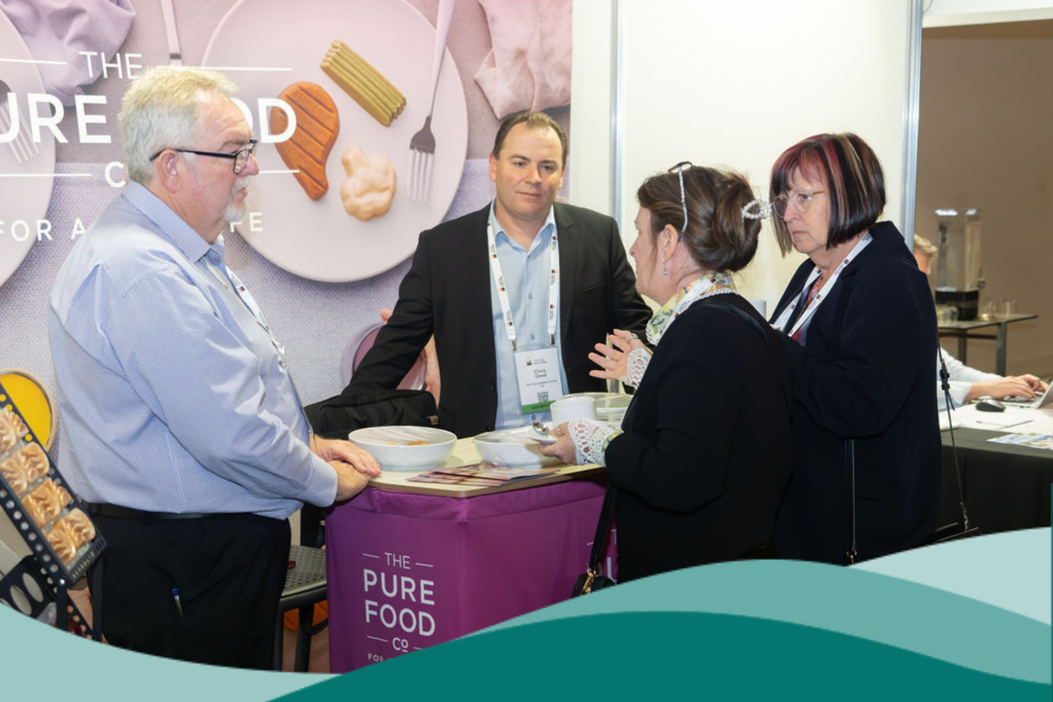 2025 WA State Conference Trade Booth Photo 4 People Networking