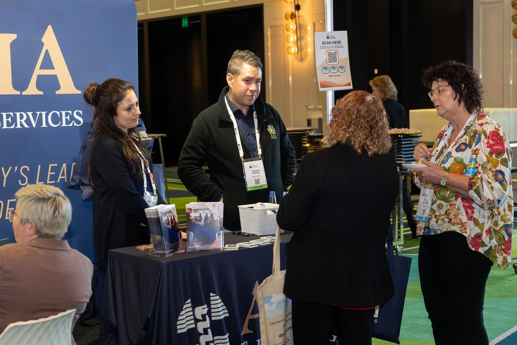 2025 WA State Conference Trade Booth 4 People Networking