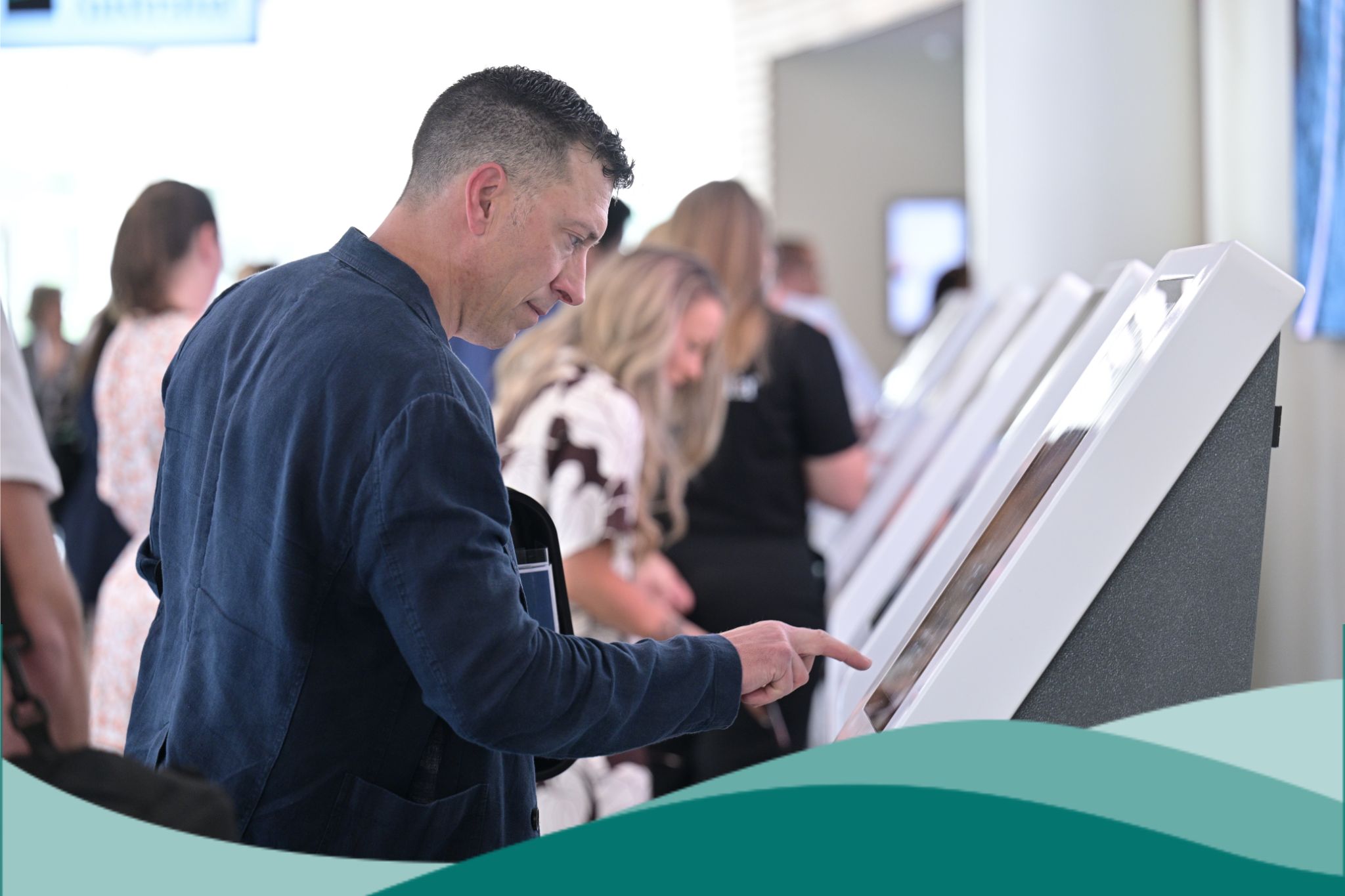 2025 National Conference Registration Kiosk 1 Person with Teal Waves